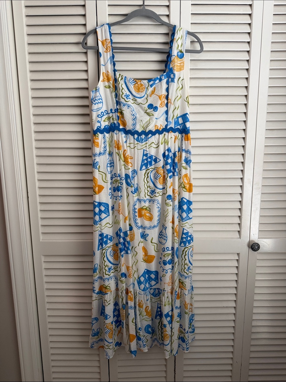 blu pepper Sleeveless White Midi Dress with Blue & Yellow Print